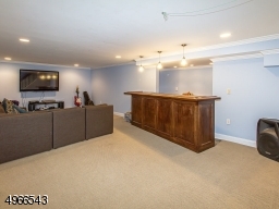 29' rec room with wall to wall carpeting and built in bar
