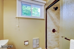 Master Bath has a large tiled shower -