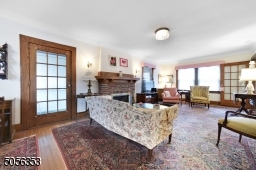 Alternate view of living room with door to 3 season sun porch