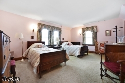 Generous primary bedroom with 2 closets and ample natural light
