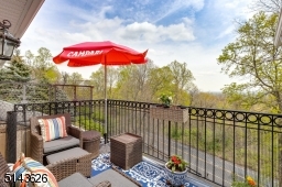 Glass Doors Open to Private Veranda