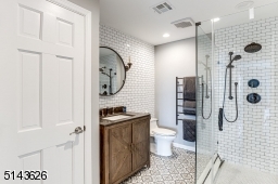 Stall Shower, Towel Warmer & Linen Closet