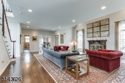 View of Office, Powder Room & Wood-Burning Fireplace