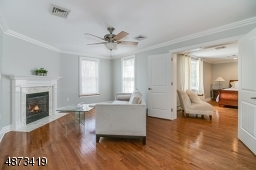 Located adjacent to the MBR, this Sitting Room features a gas fireplace, hardwood floor; freshly painted.  Accessible thru both MBR, as well as hallway