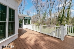 Large Trex Deck (2016); accessible from both Sun Room and Breakfast area; overlooks backyard
