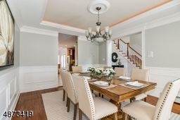 Dining Room is conveniently located adjacent to Kitchen; generously sized to accommodate a large dinner party