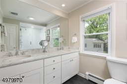 Enjoy the updated, spa-like master bathroom.