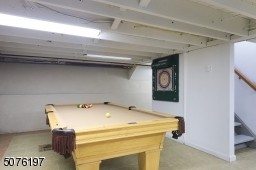 Lower Level: Large Rec Rm.  Separate Playing Pool area, Laundry, Tile Floor   NOT INC: Pool Table, W/D