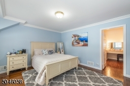 Bursting with natural light, each of the four gracious second floor bedrooms offers a soothing color palette, gleaming hardwood floors and plenty of storage spaces.