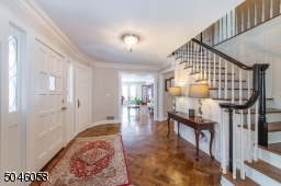 Sitting pretty on over a half acre of flower gardens, idyllic lush greens and groves of mature trees, this Colonial-style Tudor home in sought after Chatham Township flawlessly integrates modern elements with exquisite original details.