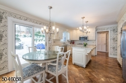 Fresh and crisp, the combined chef??s kitchen and breakfast area features designer touches and boast more than enough space for all of your culinary needs. French doors lead to a sweeping deck that is perfect for al fresco dining and backyard BBQ??s.