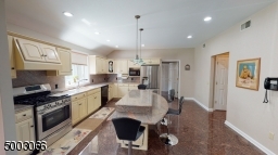 Full View of the Kitchen with Granite Floors and Countertops