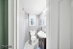 There are 2 closets near the 1st floor powder room and access into the garage.
