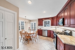 The kitchen was new in 2012. It is cherry wood with granite counters and stainless steel appliances. There is a walk in pantry.