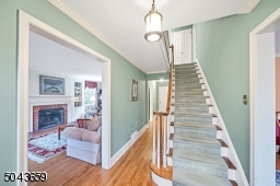 There is a new front door. The gracious front entrance is flanked by the living room and dining room. This house is sunny and bright.