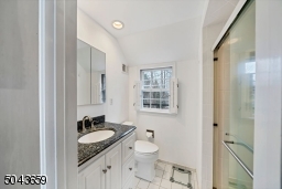 The master en-suite has a stall shower.
