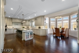 Tons of natural light fills this bay nook with vaulted ceiling making it the ideal eating area
