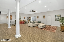 Access to backyard through sliders. This space is perfect for a pool or ping pong table!