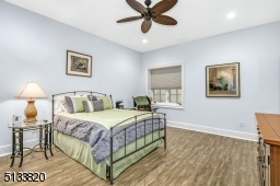 Located on the lower level with egress window, walk-in closet and full bath