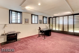 Den being used as second office. Built in with Wet Bar
