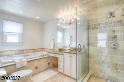 Full full of master bathroom showing glass door shower