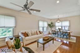 Hardwood floors, recessed lighting, 3 double windows, crown molding
