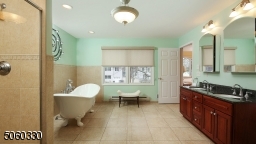 luxury bathroom with soaking tub,