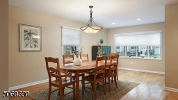 Formal dining room with a picture window.