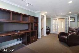 Home office space in the finished, walk-out ground level.