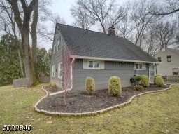 Side and back view of house